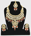 Close-up of a gold-plated Kundan stone necklace set