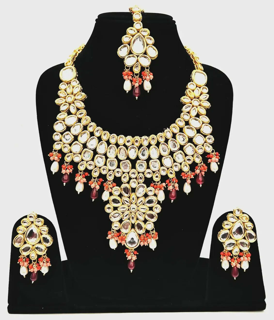 Close-up of a gold-plated Kundan stone necklace set