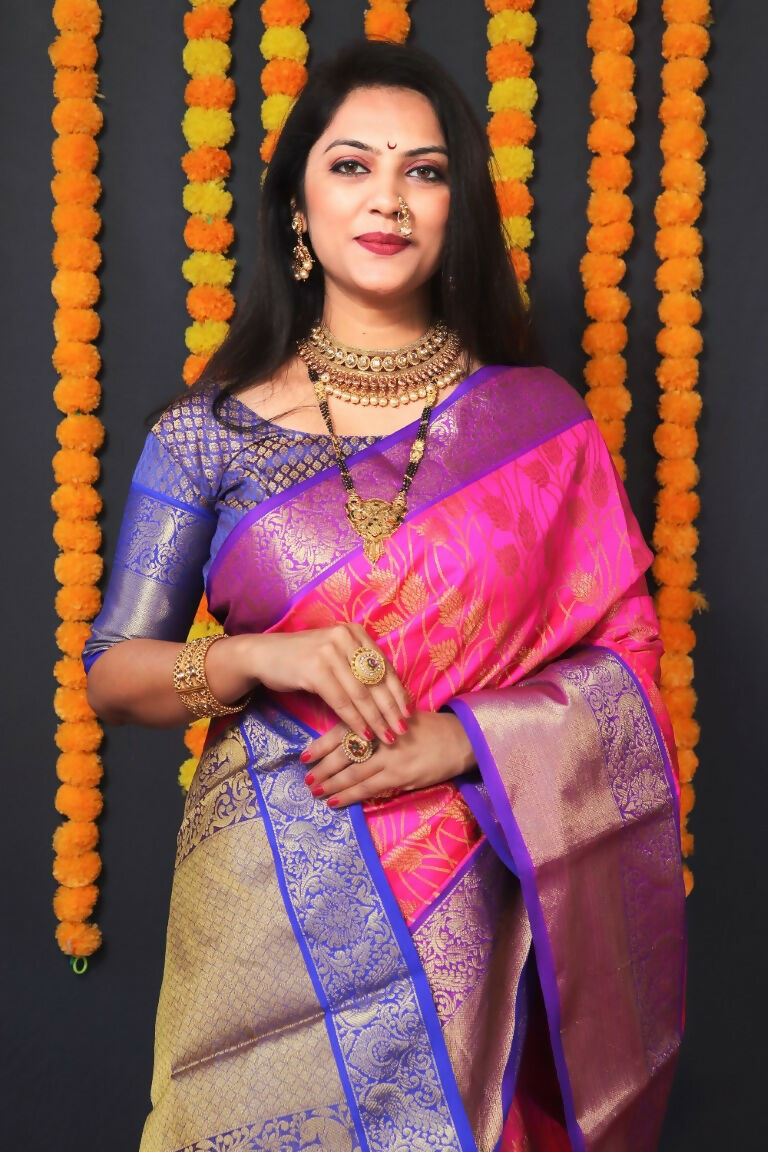 Pink Kanjivaram Silk Saree with Blue Blouse and Zari Woven Border