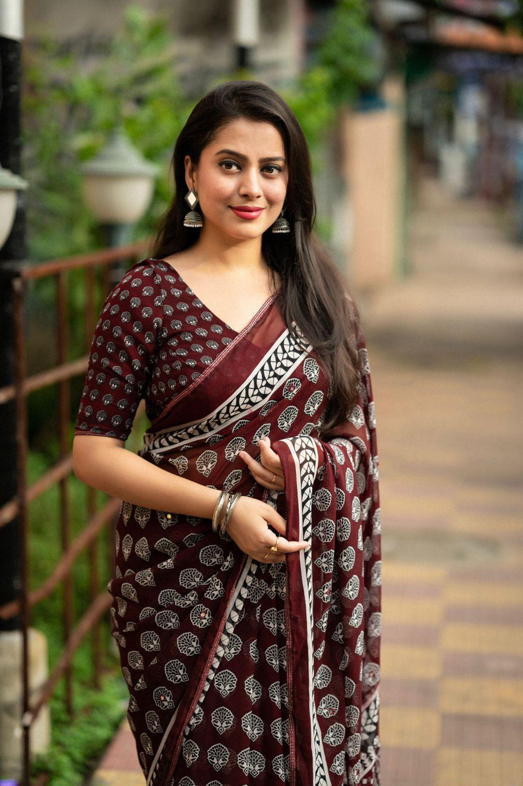 Maroon Poly Georgette Ajrak Saree with Aari Mirror Work