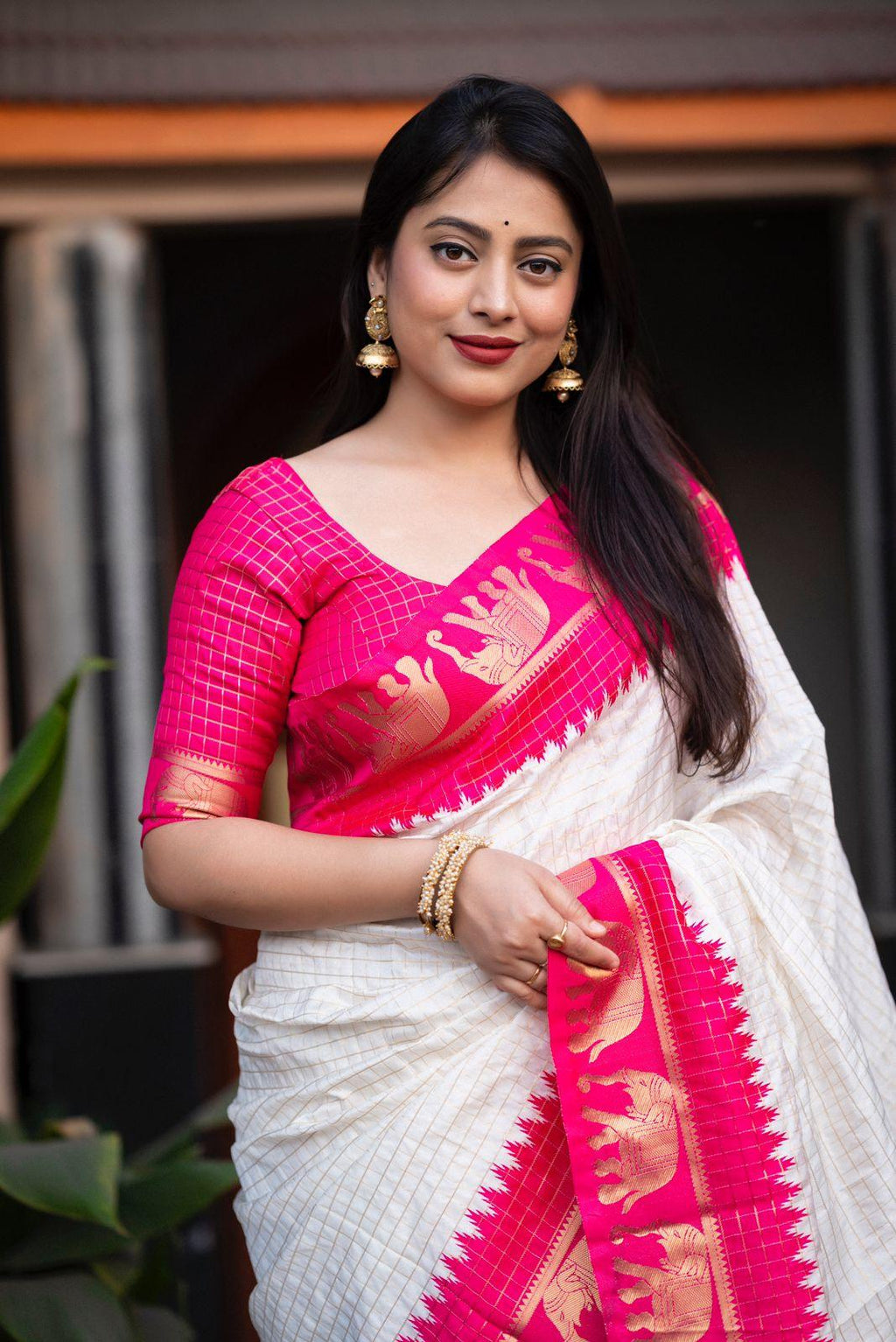 Rani Silk Zari Woven Saree with Elephant Border and Rich Pallu