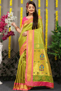 Green Banarasi silk saree with Zari work and pink blouse