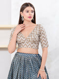 Grey jacquard sleeveless blouse with V-neckline