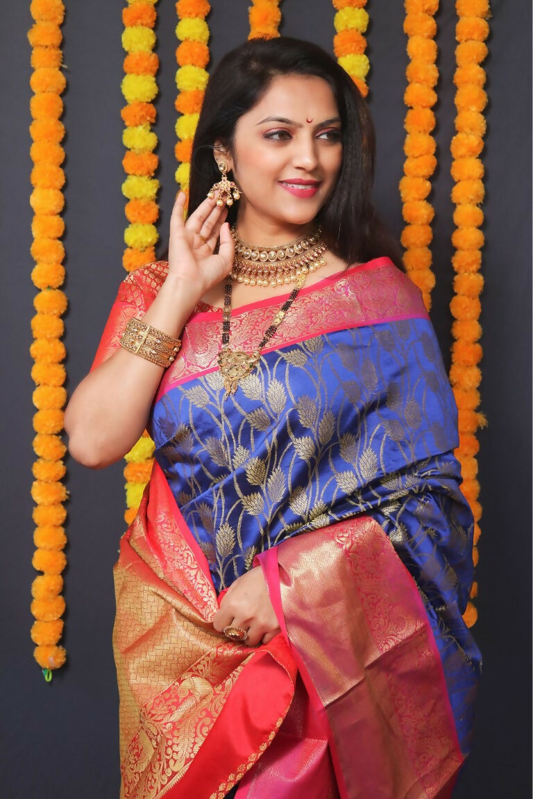 Blue Kanjivaram Silk Saree with Contrast Red Blouse and Zari Work