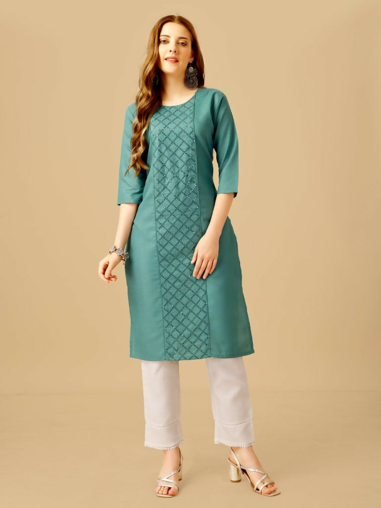 Woman wearing a teal Cotton Magic Slub embroidered kurta pant set with sequence details