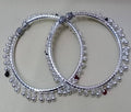 Elegant Rajasthani Hasli design anklets for women featuring silver, red, and black details.
