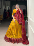 Yellow Tasar Silk lehenga choli with Bandhej print and Gotta Patti lace border