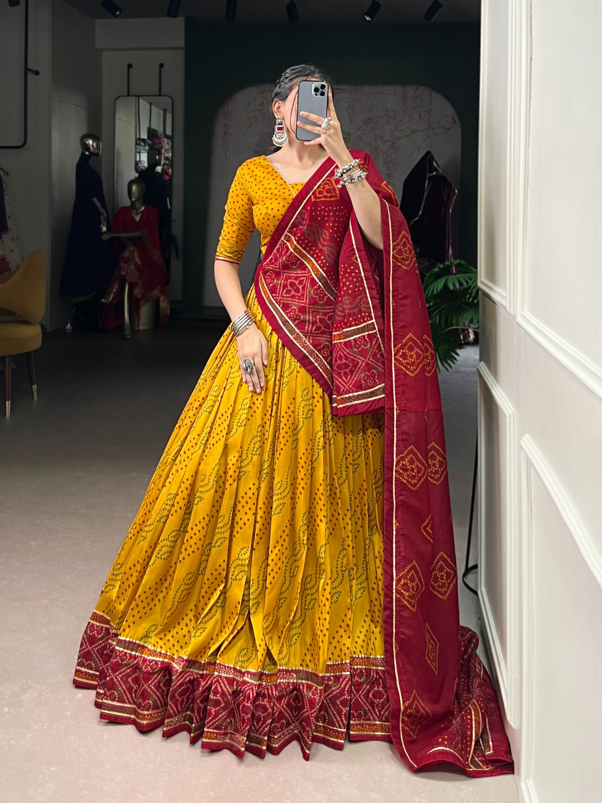 Yellow Tasar Silk lehenga choli with Bandhej print and Gotta Patti lace border