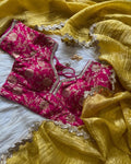 Yellow Rani tissue crush saree with jacquard silk blouse and fancy lace trim