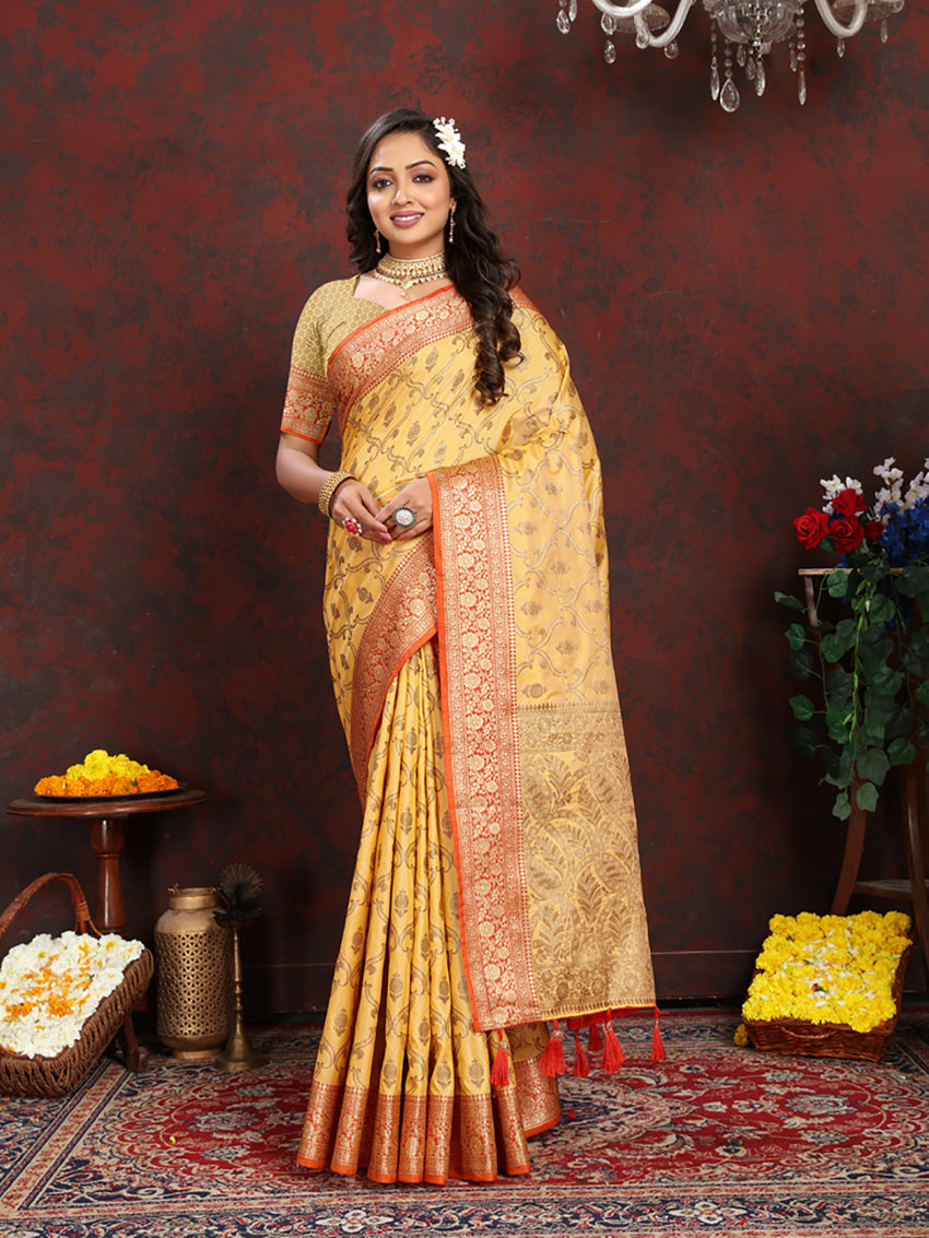 Bright yellow soft katan silk saree with intricate zari work and woven pallu