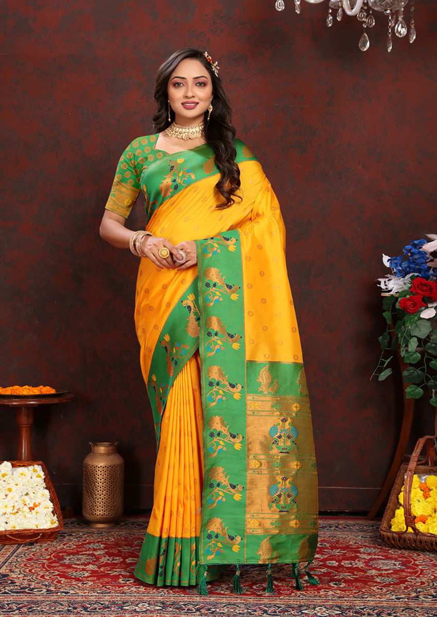 Yellow Soft Paithani silk saree featuring detailed Zari Meenakari work