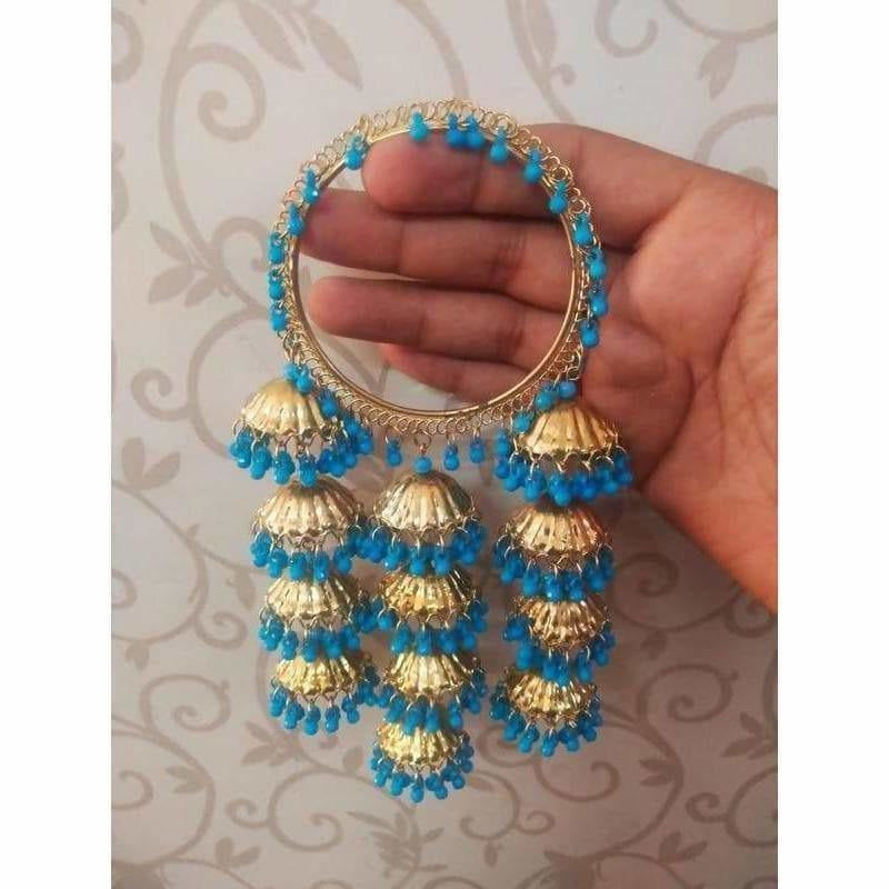 Trendy sky blue pearl bangles with hanging gold jhumkas
