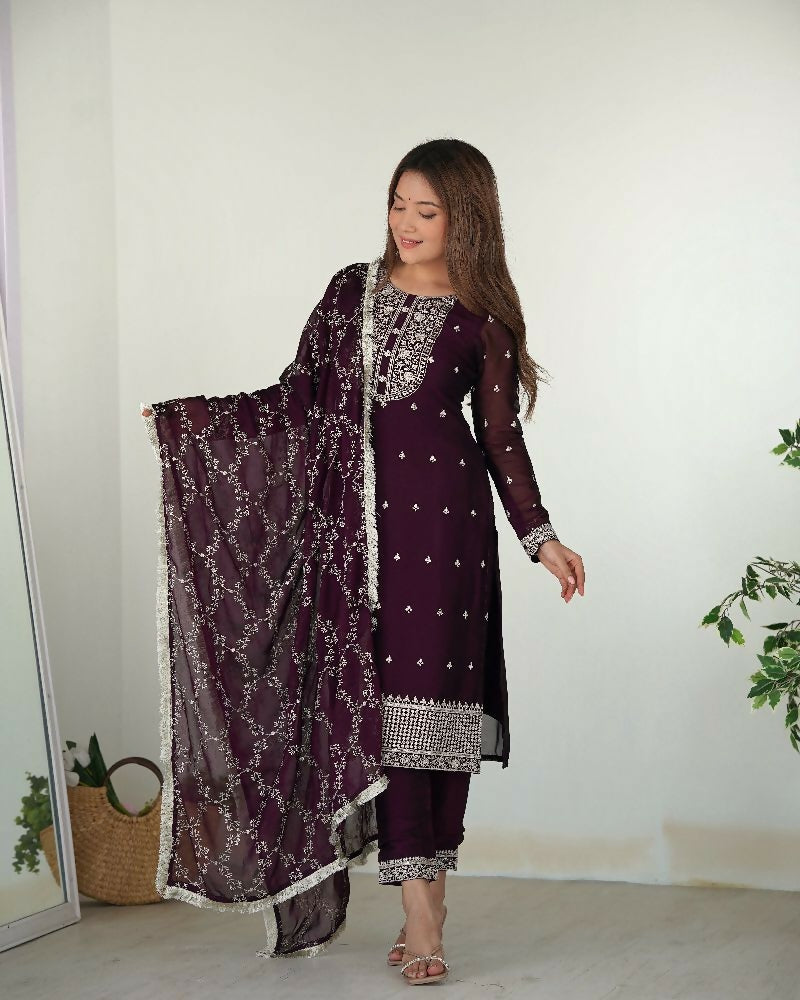 Elegant wine-colored silk kurta set featuring detailed sequence embroidery work