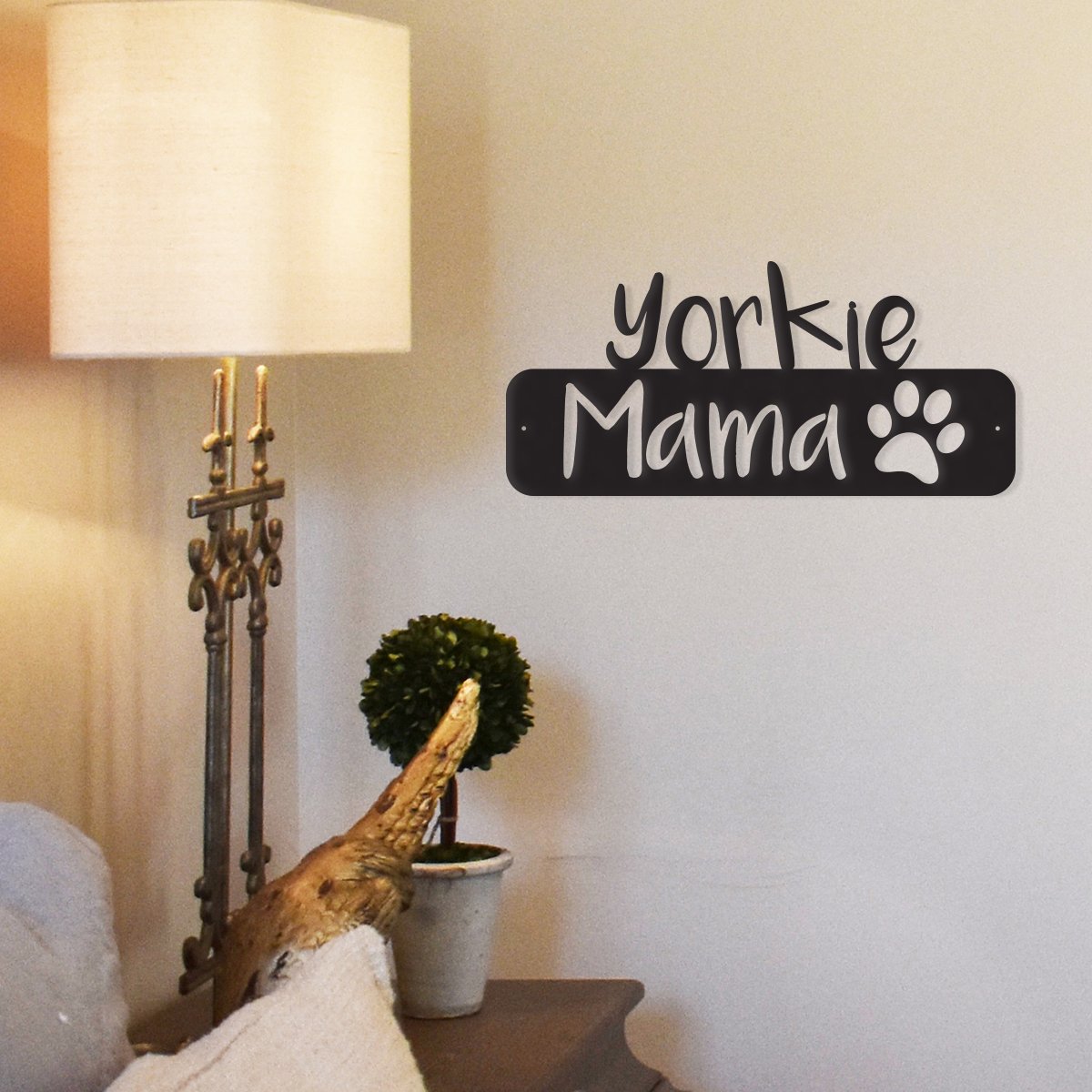 Black metal wall sign that says Yorkie Mama with a paw print icon
