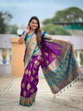 Close-up of magenta soft Banarasi silk saree with Zari weaving and Meenakari design