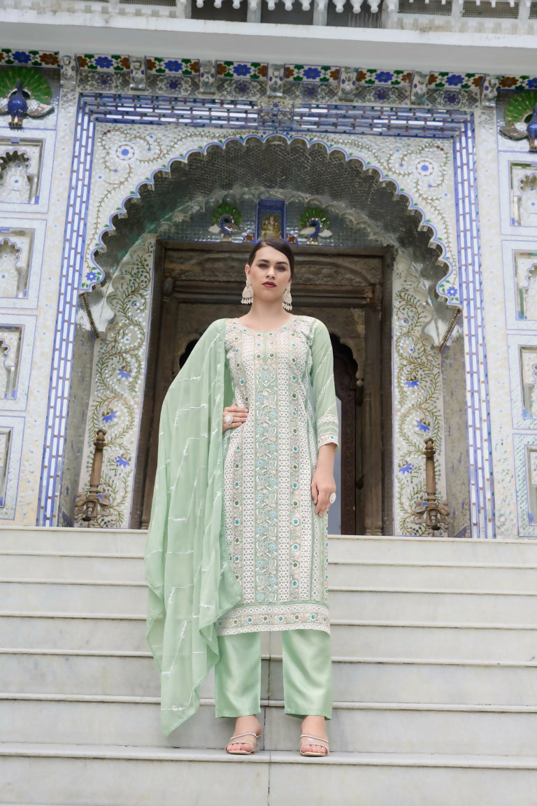 Sea green knee-length faux georgette kurta with detailed embroidery and moti work.