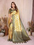 A vibrant yellow tissue silk saree with intricate Paithani woven patterns.