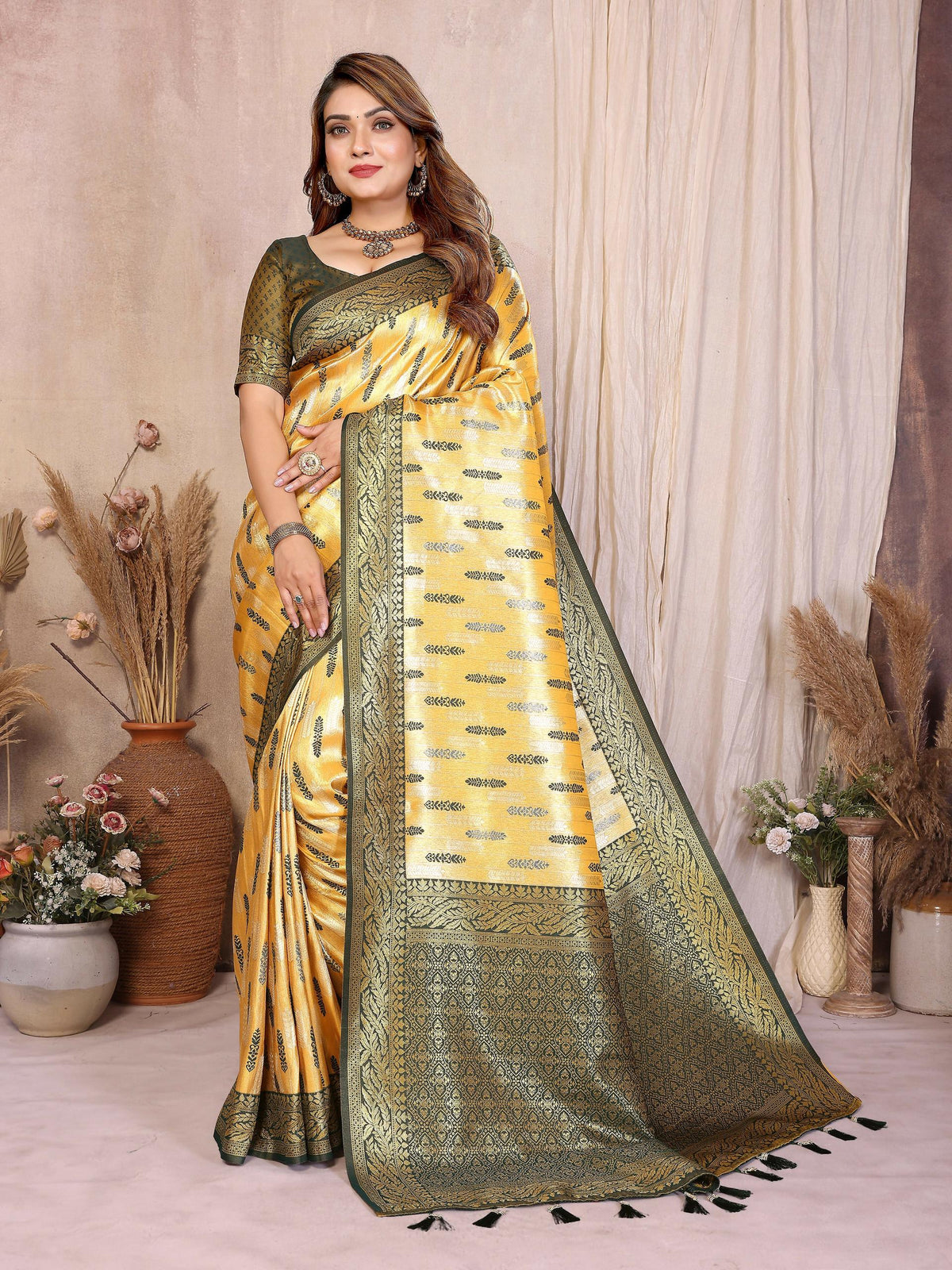 A vibrant yellow tissue silk saree with intricate Paithani woven patterns.