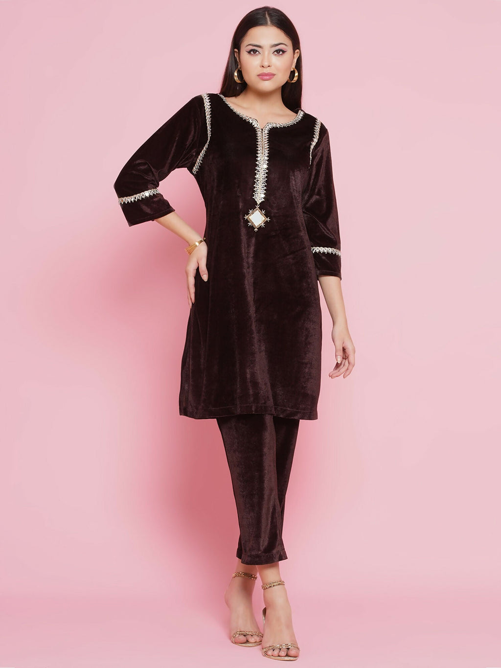 Elegant brown velvet coord set with intricate hand-embellished mirror work details