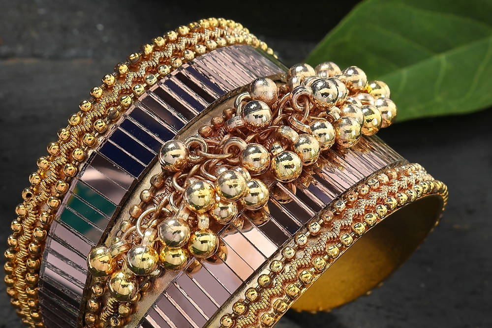 Oxidised gold-polished alloy cuff bracelet with ghungroo bells and mirror detailing