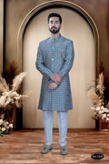 Boys blue brocade ethnic kurta with white polo pyjamas for festive occasions