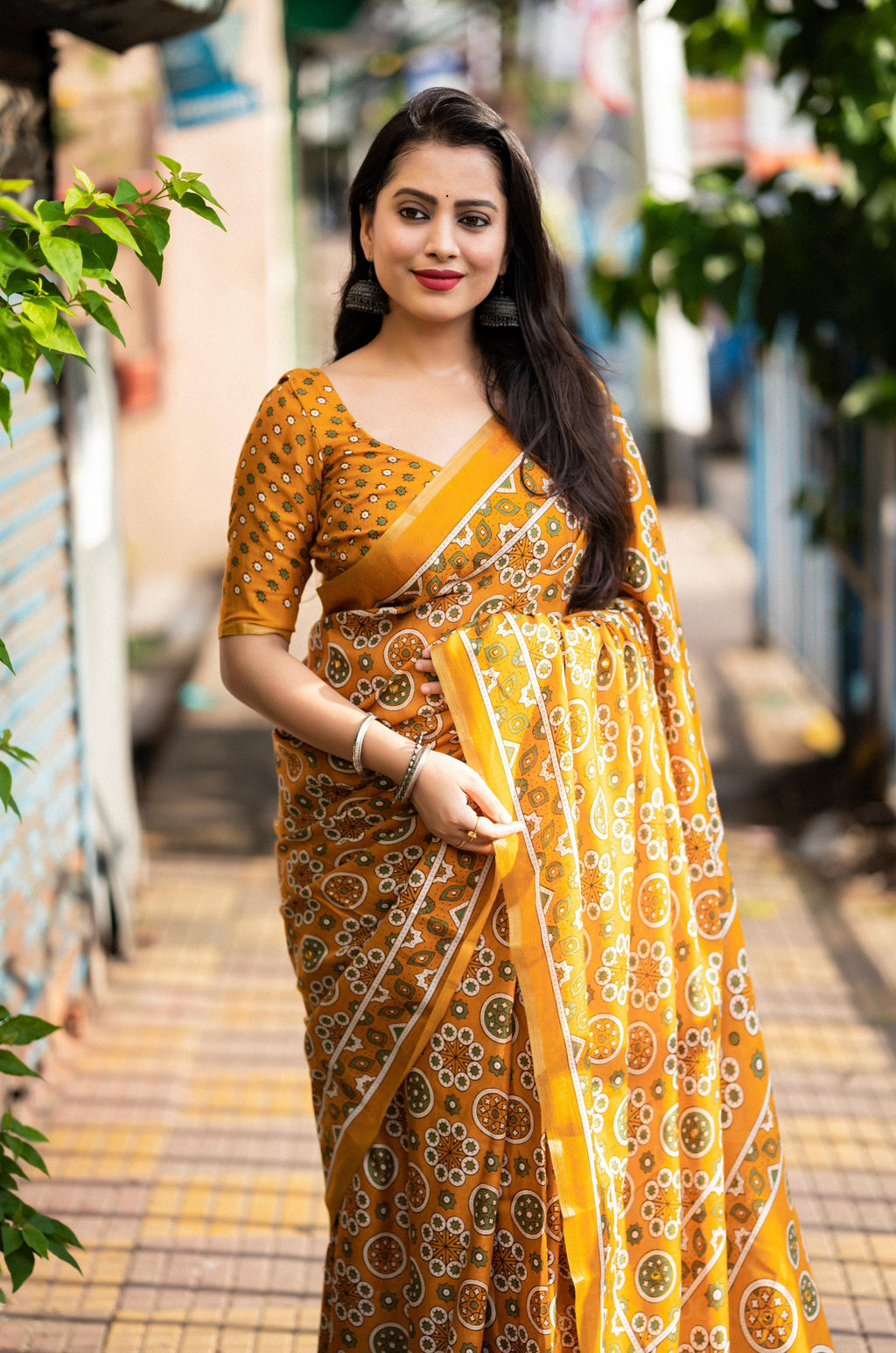 Mustard Cotton Blend Ajrak Saree with Zari Border and Blouse Piece