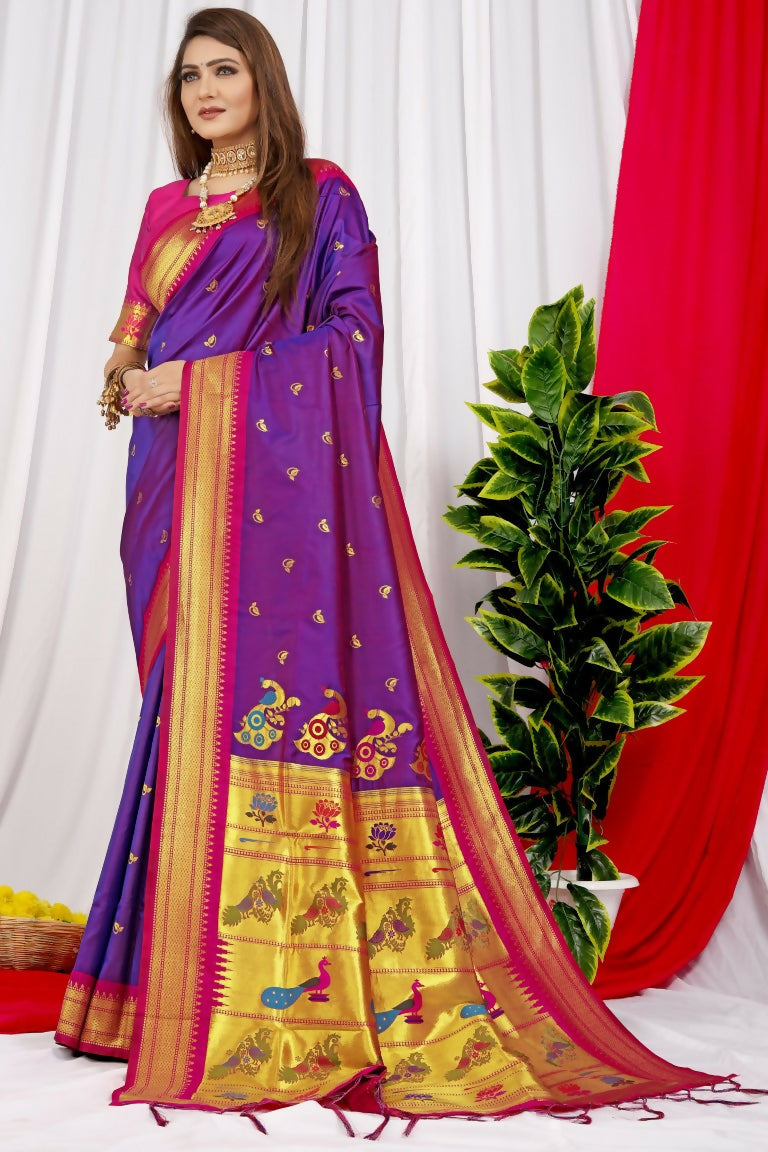 Purple Paithani silk saree with zari work and magenta blouse