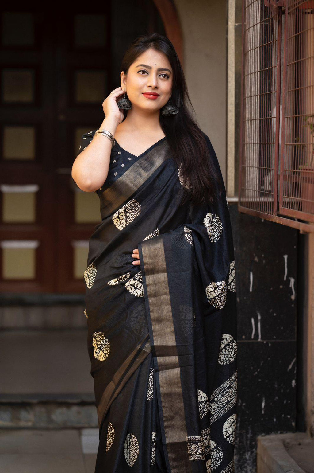 Black Cotton Crepe Saree with Traditional Batik Print and Zari Border