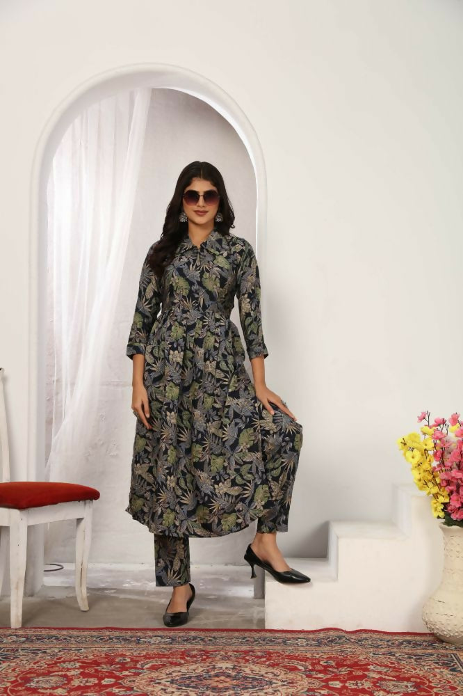 A straight-cut black Chanderi silk kurti with floral print and side pockets