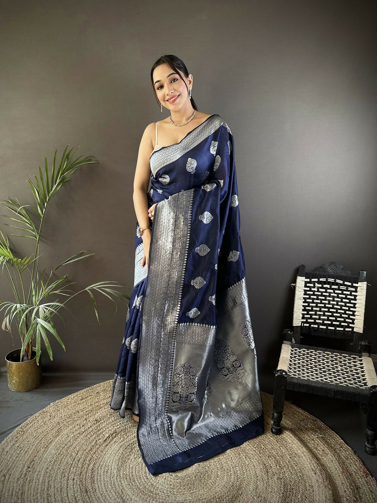 Navy Blue Soft Silk Banarasi Saree with floral motifs and matching blouse