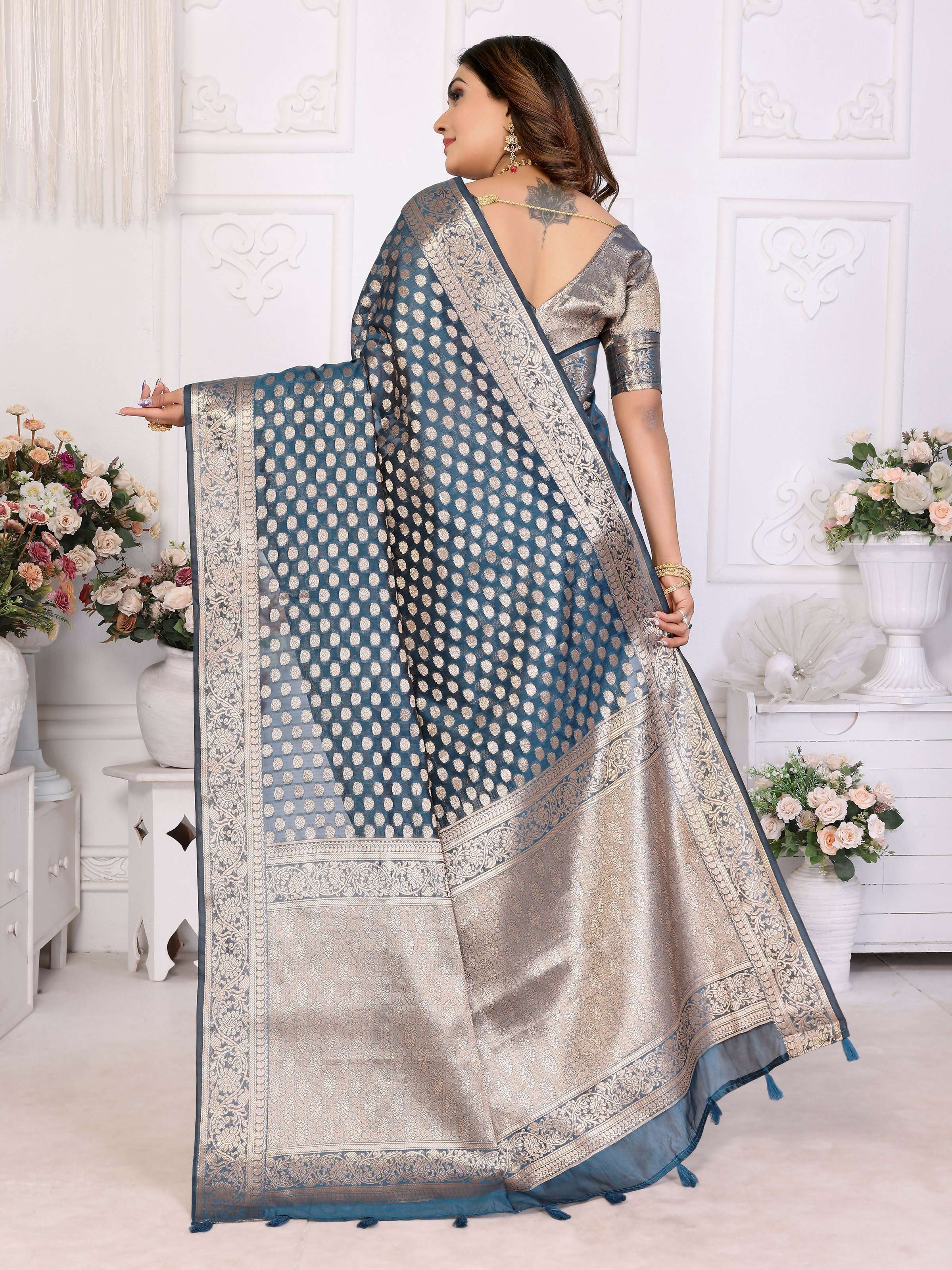 Teal Organza Silk Saree with Intricate Weaving Work