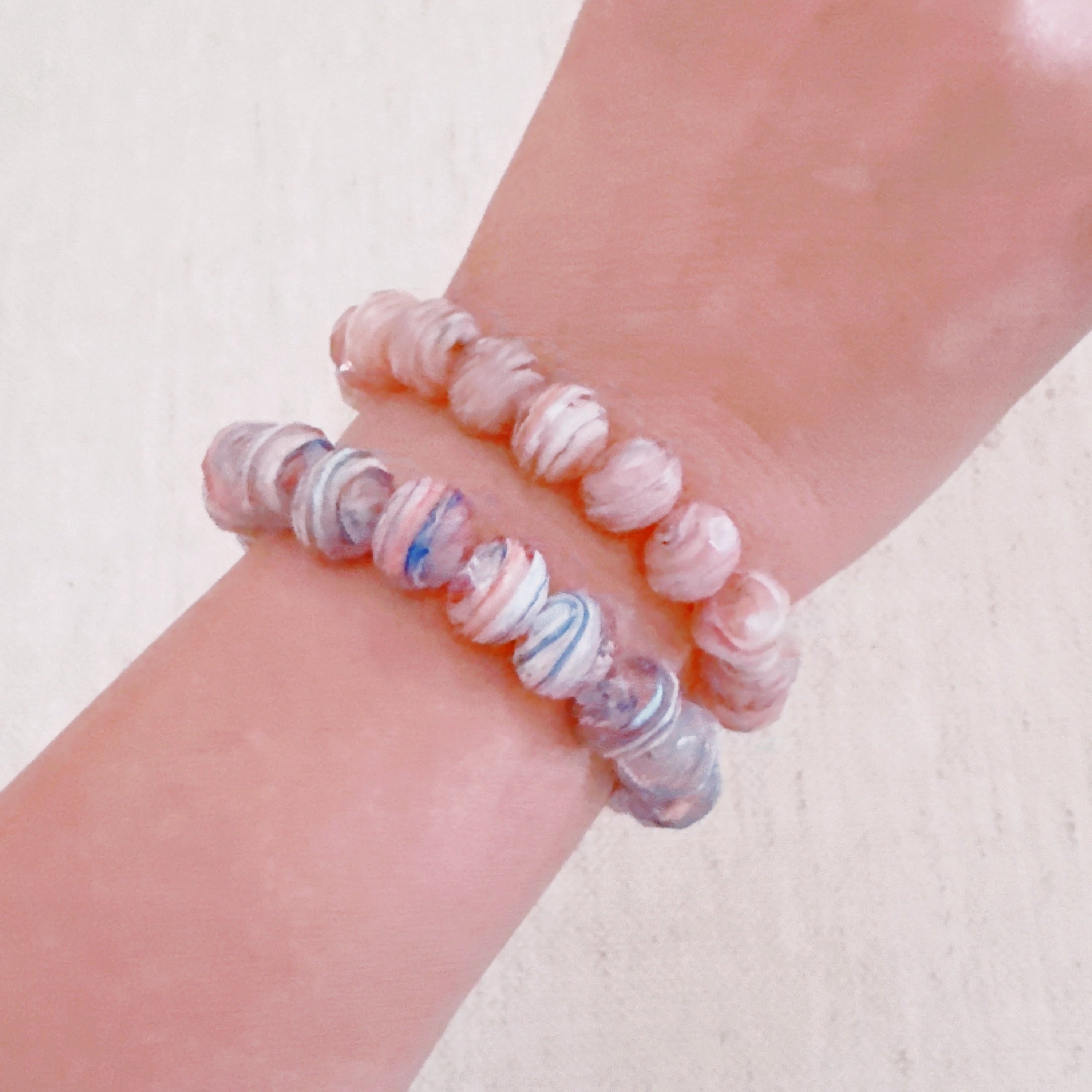 Close up of Zion Canyon stretch bracelet with marbled natural tone glass beads.
