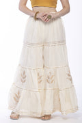 Off white cotton sharara pants featuring traditional gotta work detailing and string closure