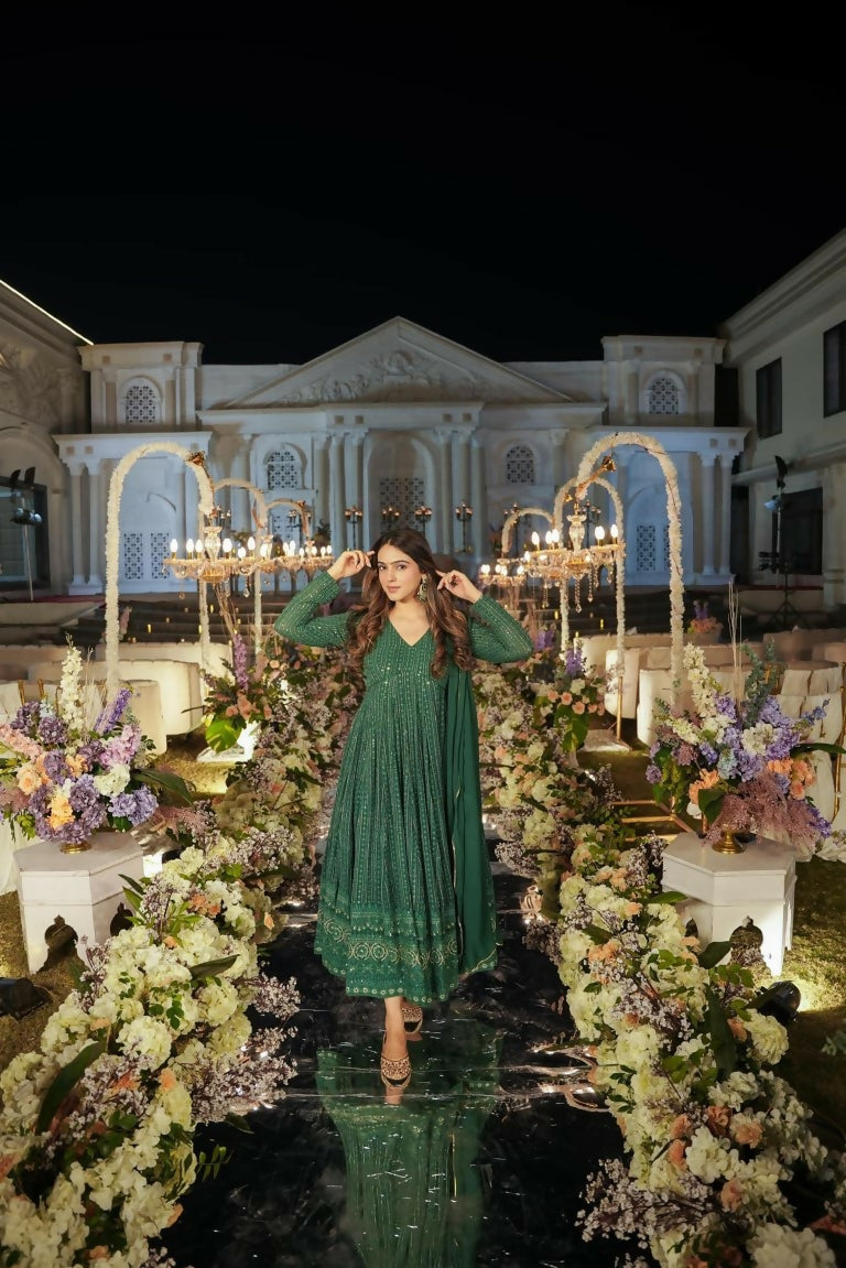 Green faux georgette Anarkali dress with gold zari and sequence embroidery