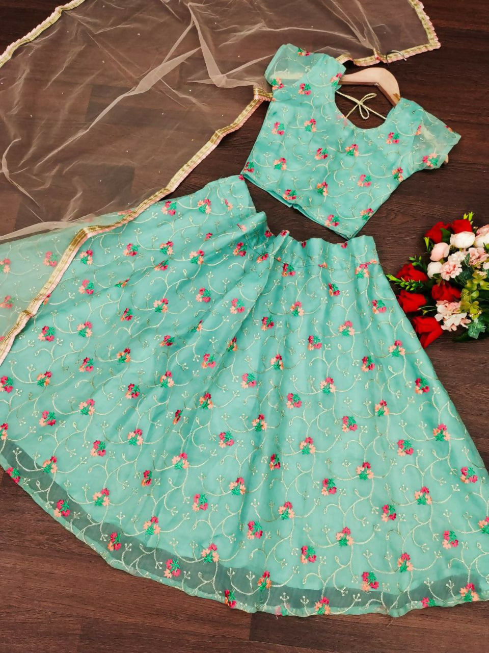 Sky blue organza silk embroidered lehenga choli set for girls featuring delicate embroidery