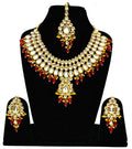 Exquisite handmade gold-plated Kundan jewellery set featuring vibrant red stones