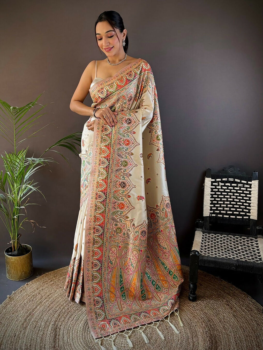 Elegant white soft silk saree featuring intricate Meena weaving patterns with an unstitched blouse piece