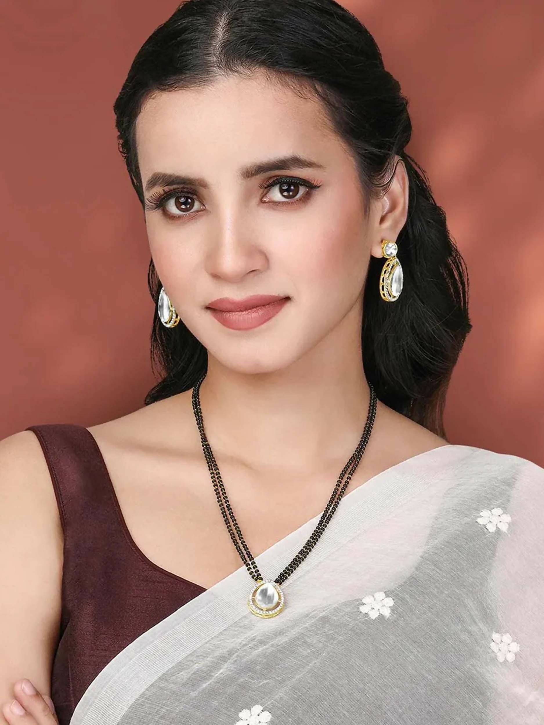 White Mangalsutra set with matching earrings