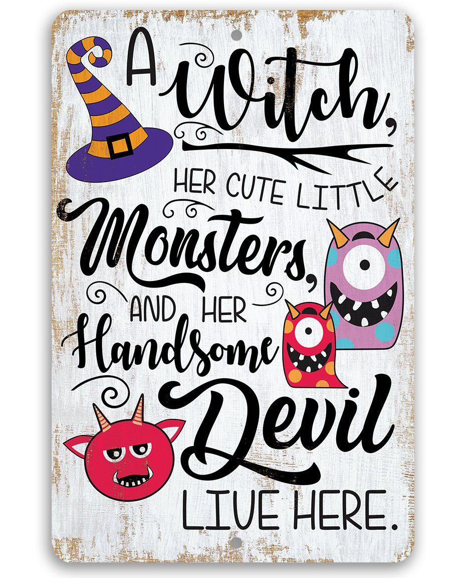 Decorative metal Halloween sign featuring a witch hat, colorful monsters, and the text A Witch, Her Cute Little Monsters, and Her Handsome Devil Live Here.