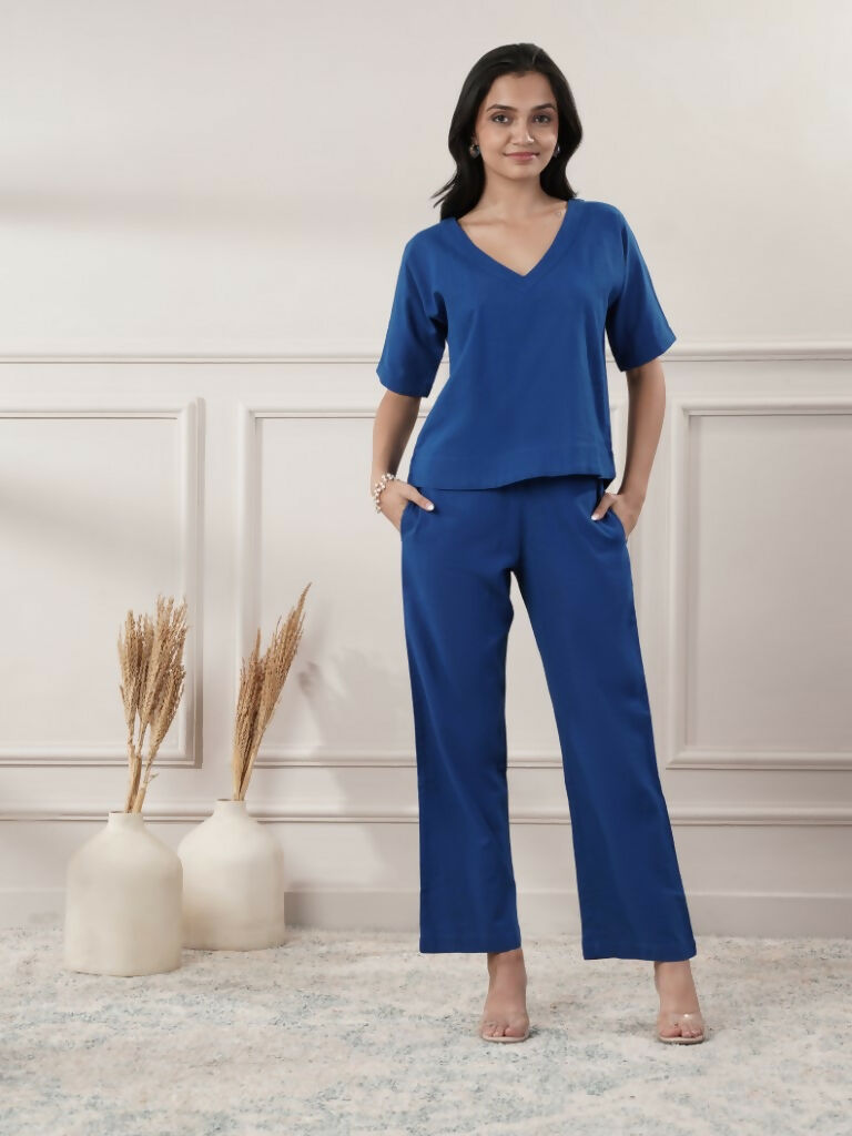 Model wearing a vibrant Royal Blue V-neck 2-piece co-ord set with half-length sleeves