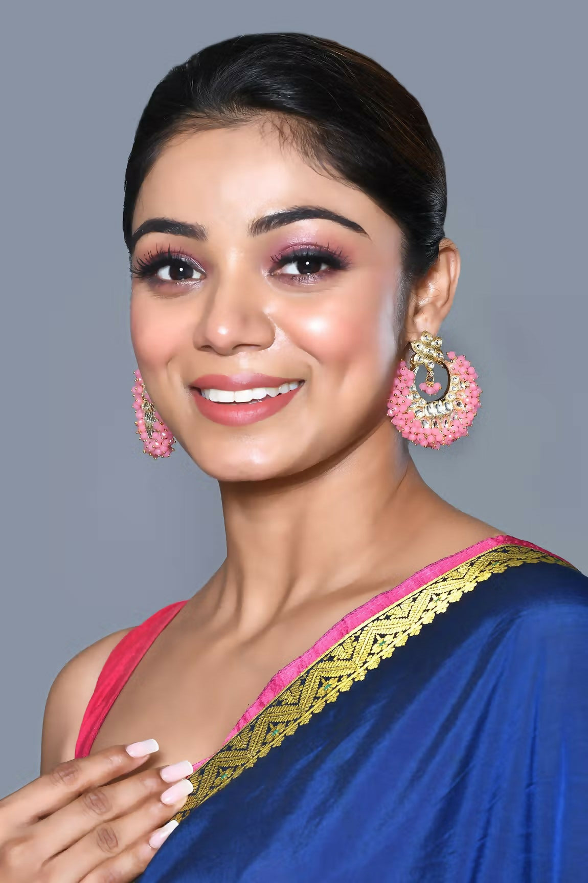 Elegant Kundan and Pearl drop earrings in gold, white, and pink tones