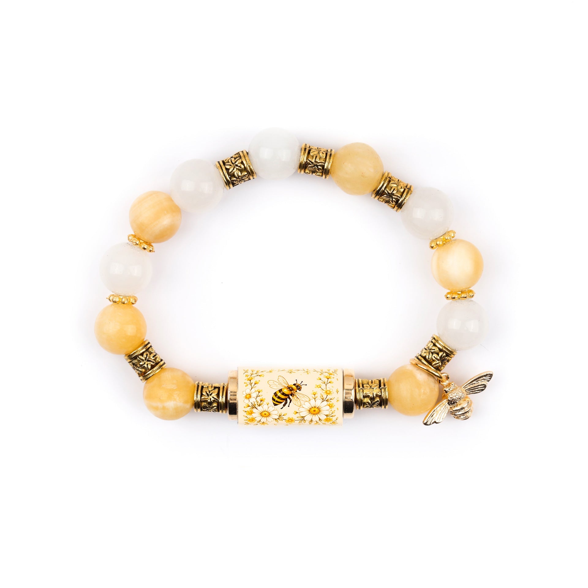 Gold plated bracelet featuring a white chalcedony inlaid cross charm on a white background.