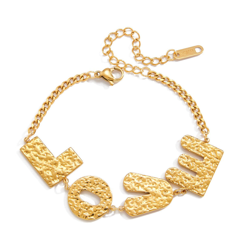 Minimalist gold-plated letter bracelet on a sleek titanium steel chain.