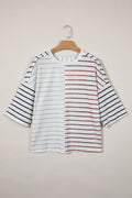 A relaxed-fit stripe colorblock t-shirt with 3/4 sleeves and a round neckline