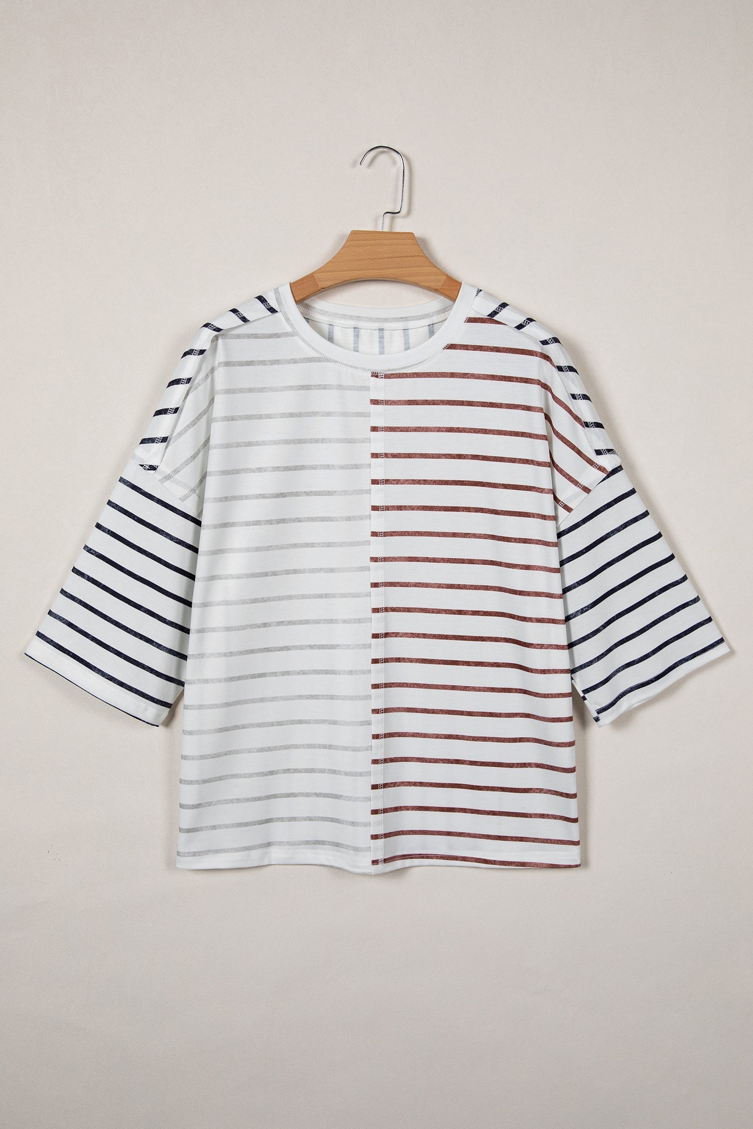 A relaxed-fit stripe colorblock t-shirt with 3/4 sleeves and a round neckline