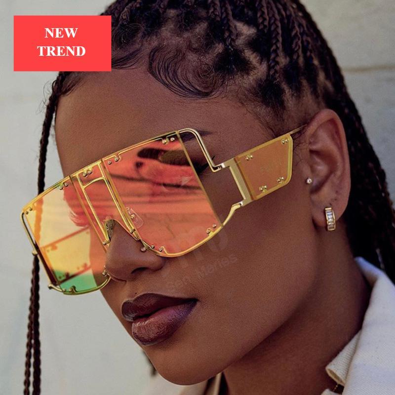 Women wearing luxury oversized square sunglasses with metal rivets in a glamorous streetwear style