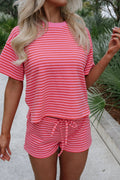 A comfortable rose-colored striped knit tee with a side split and matching drawstring shorts set.