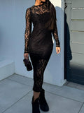 Black midi dress featuring intricate lace detailing and long sleeves.