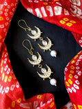 Traditional gold-tone Kundan earrings with white pearl drops for ethnic wear