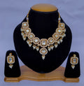 Traditional gold plated necklace set with Kundan stones and statement design